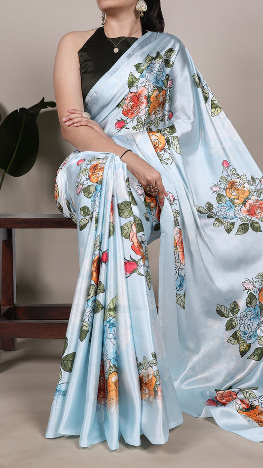 Sophisticated satin saree featuring a beautiful floral design.