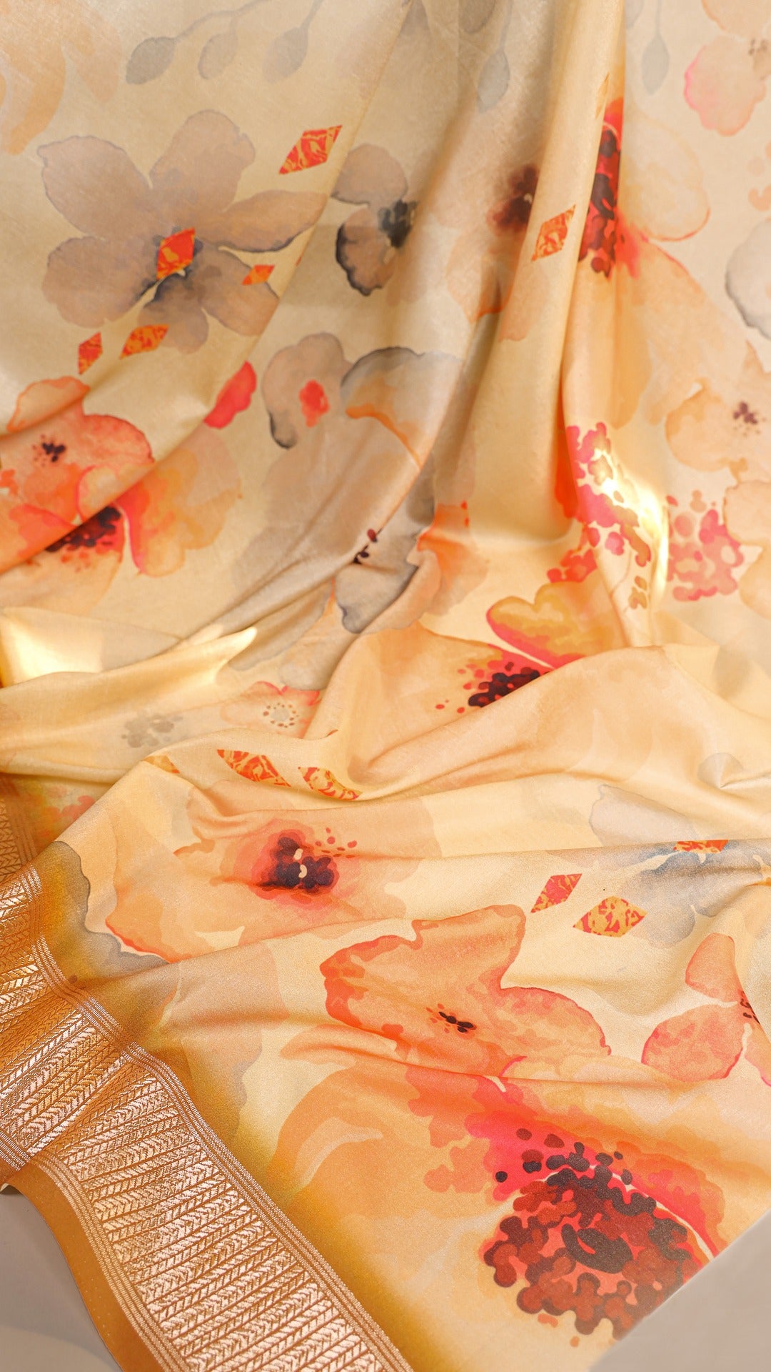 Full view of a woman draped in a stylish blue and white floral printed Tussar silk saree.