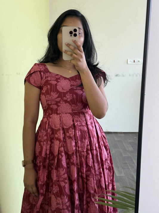 Close-up of the Maroon Lotus floral dress. Note the soft cotton fabric and flattering neckline.