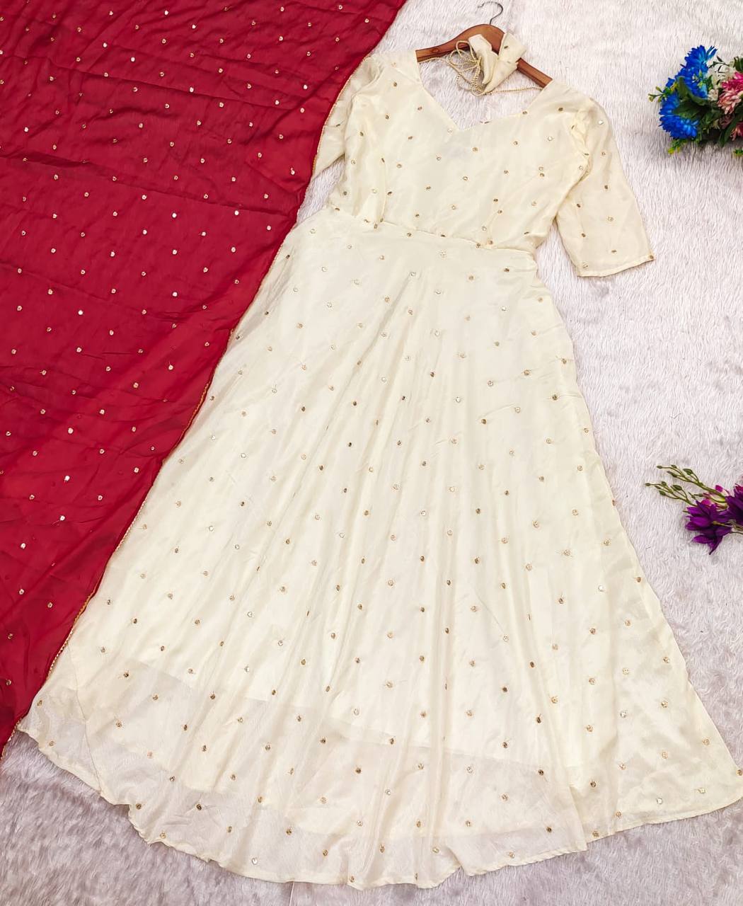 Flat lay of the Red Victoria Suit Set with dupatta.