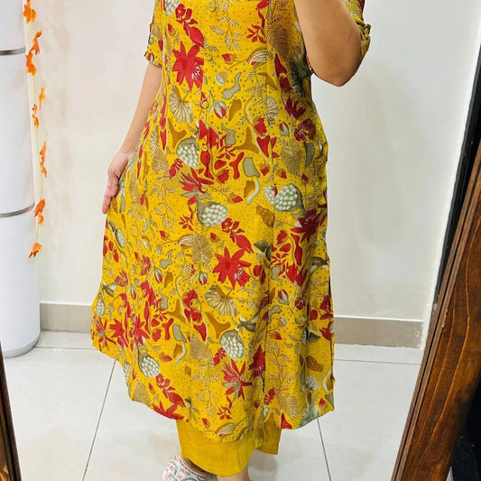 A-line Yellow Forest Kurti with red and green floral print, shown with matching yellow bottoms.