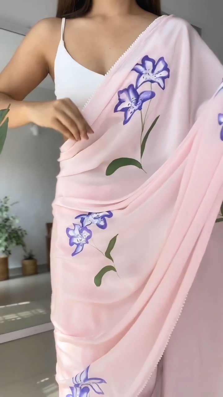 Floral georgette saree in pink.