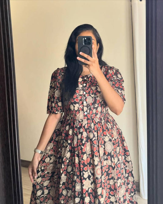 Close-up of Kalamkari Maxi dress with button yoke detail in mirror selfie.