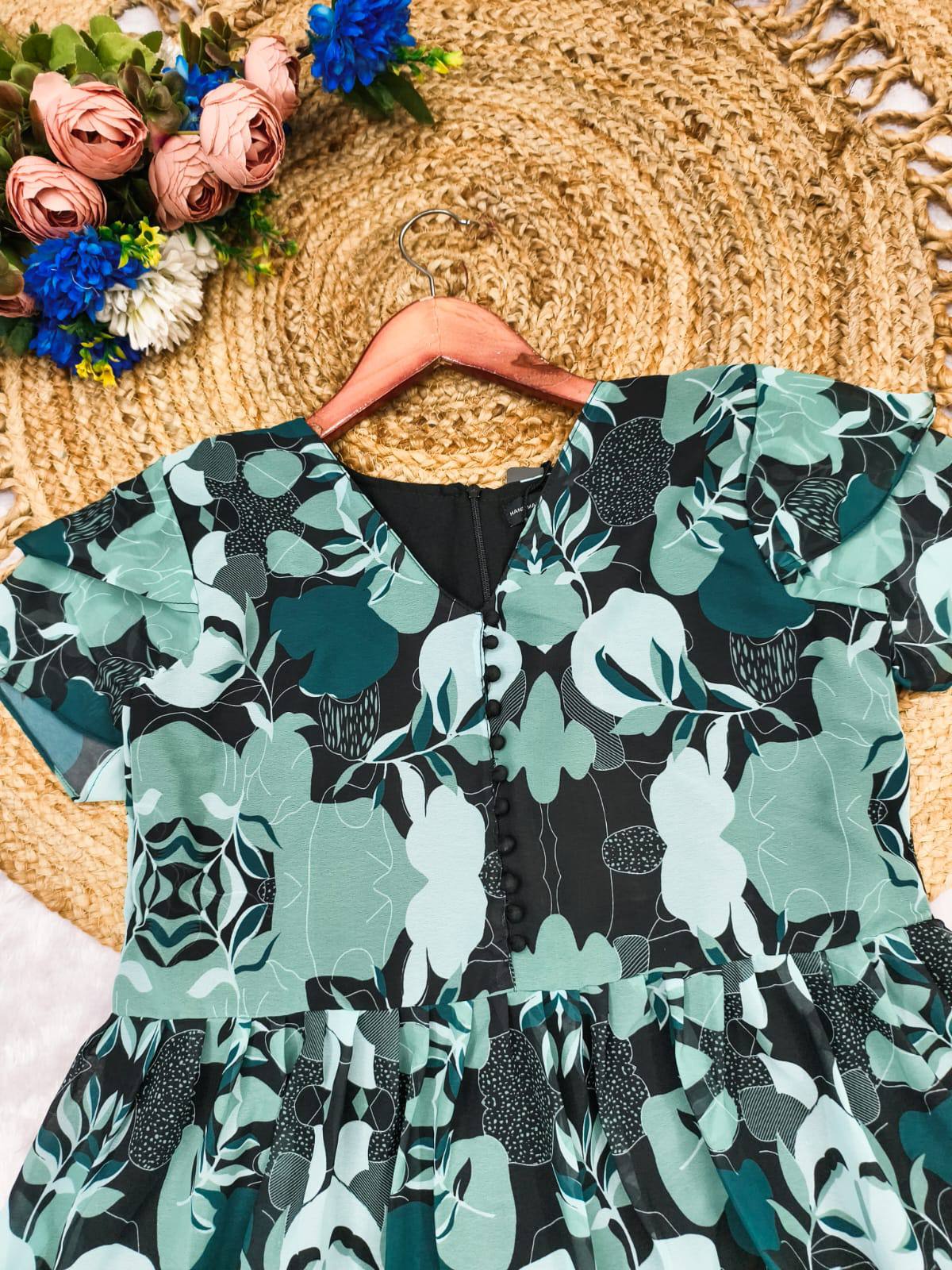 Flowing tiered skirt detail on floral Georgette maxi dress