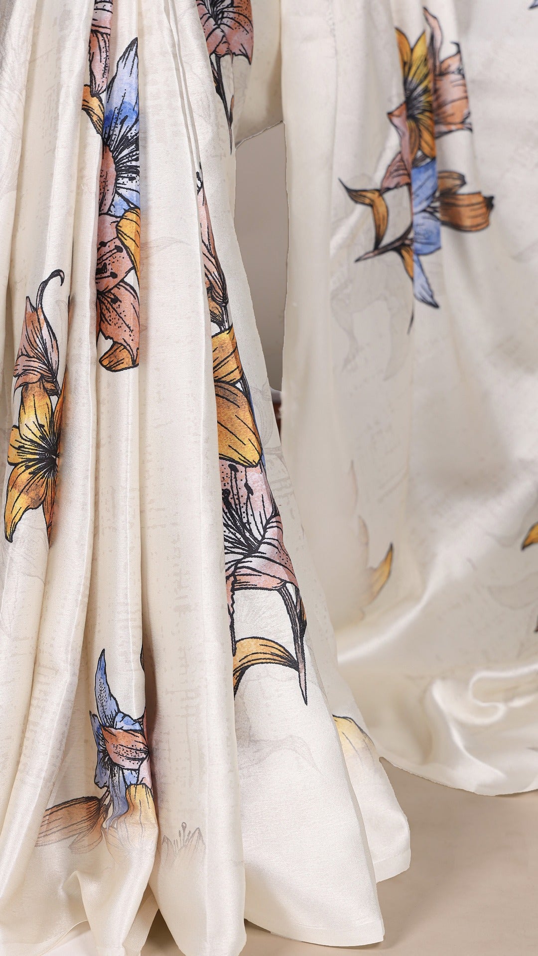 Gorgeous floral satin saree, perfect for weddings.