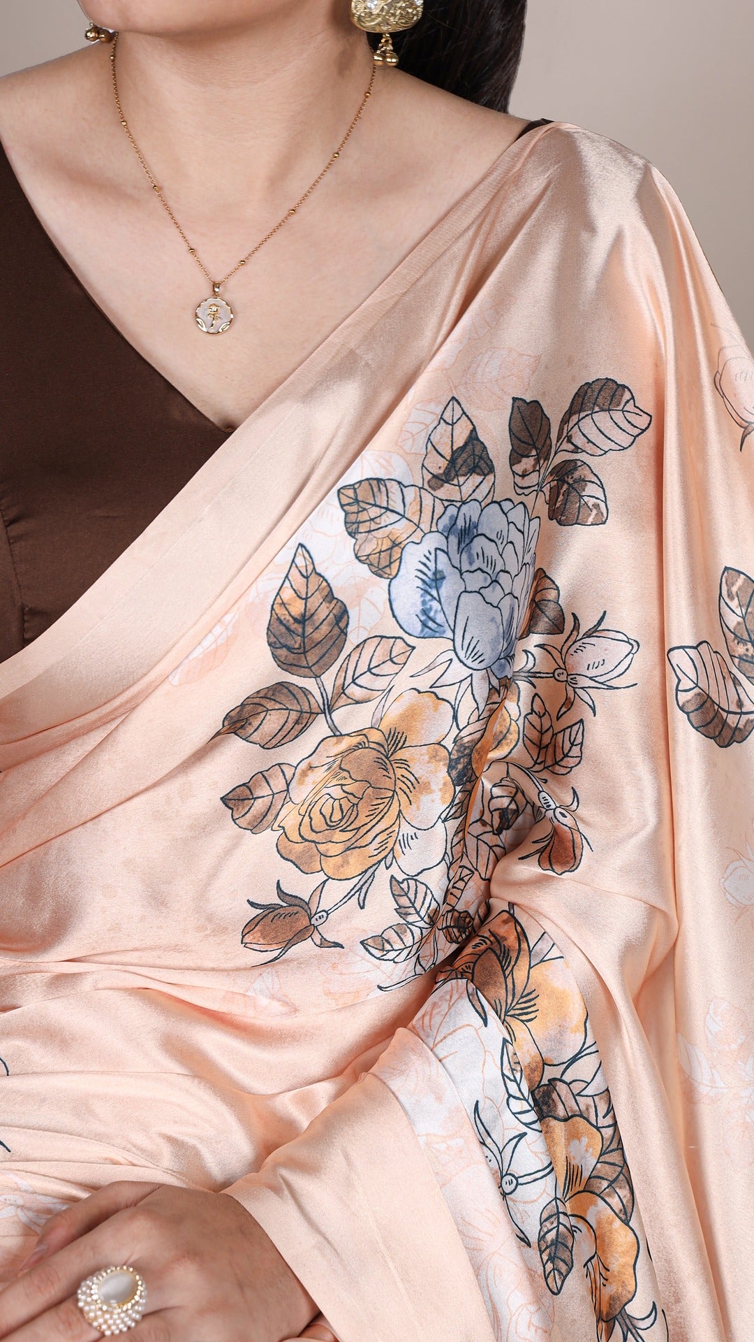 Stylish floral satin saree, ideal for parties.