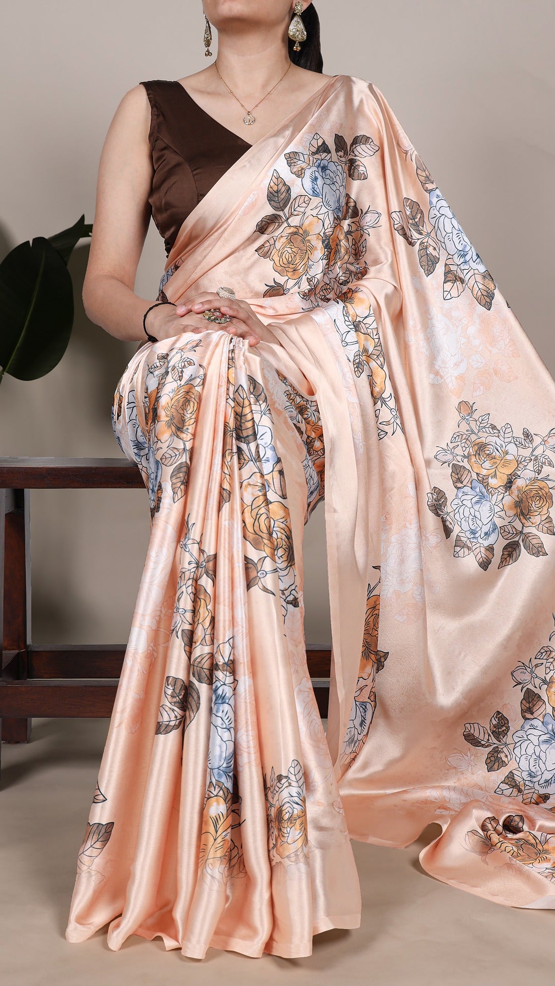 Beautiful floral design on a smooth satin saree.