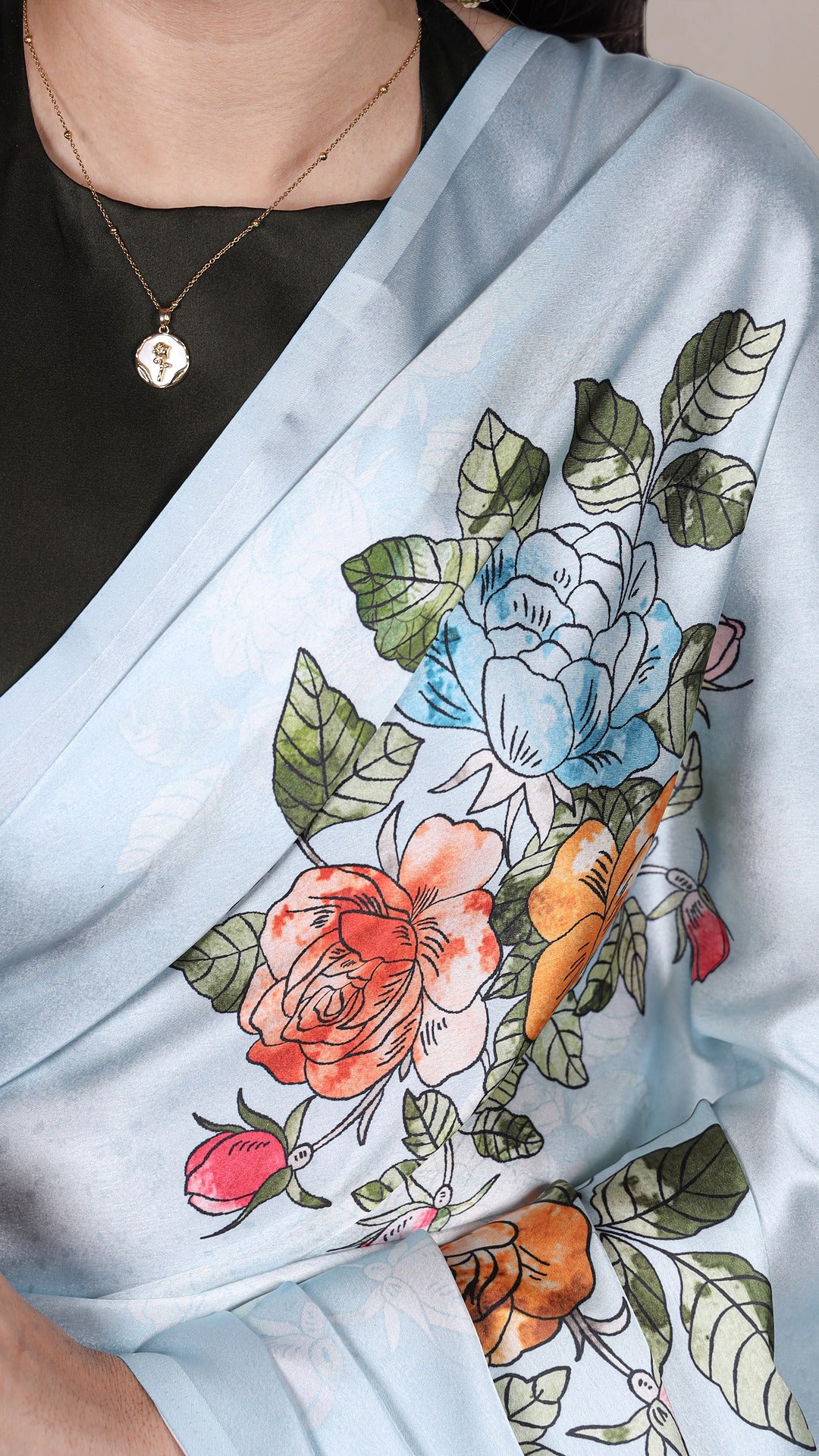 Floral print satin saree, luxurious and stylish.