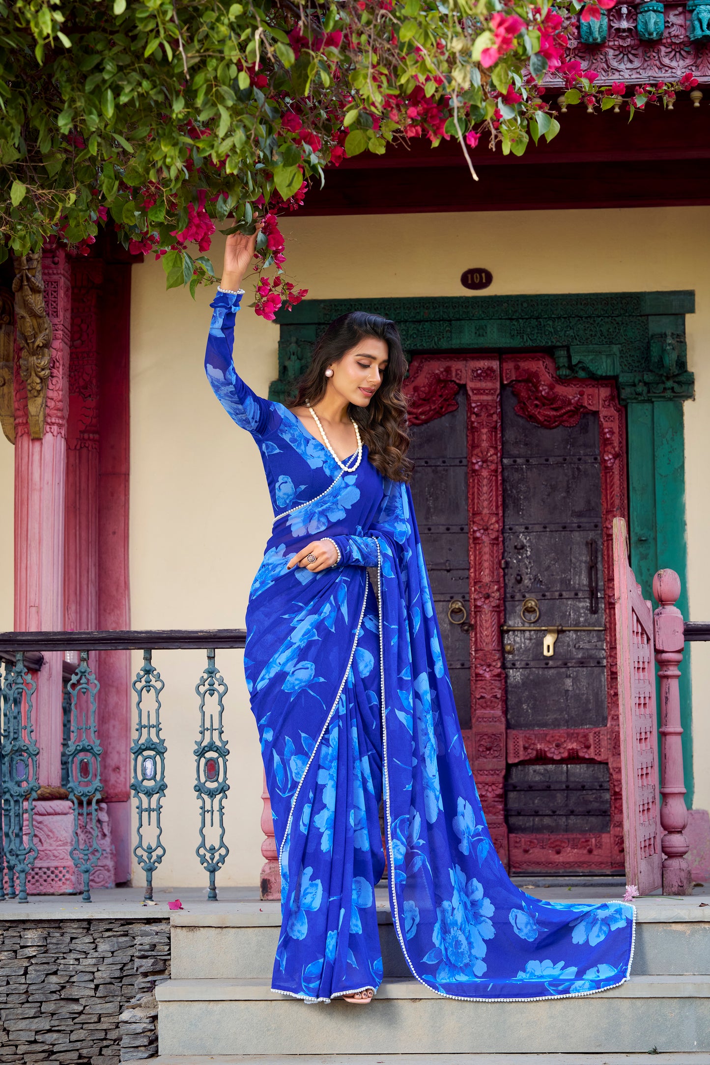 Elegant Floral Saree in lightweight blue floral fabric.