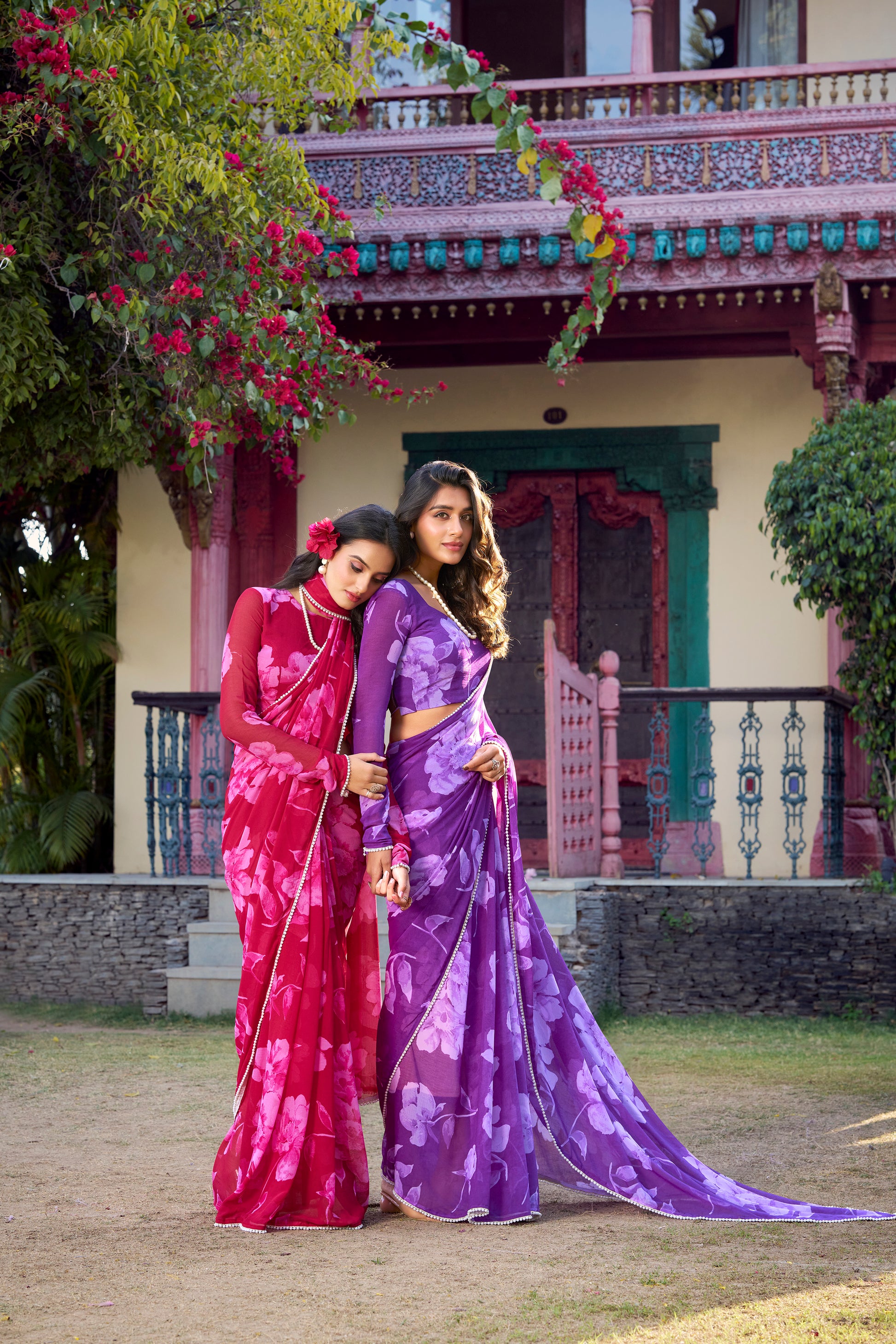 Blue Floral Saree with pearl-like border accents.