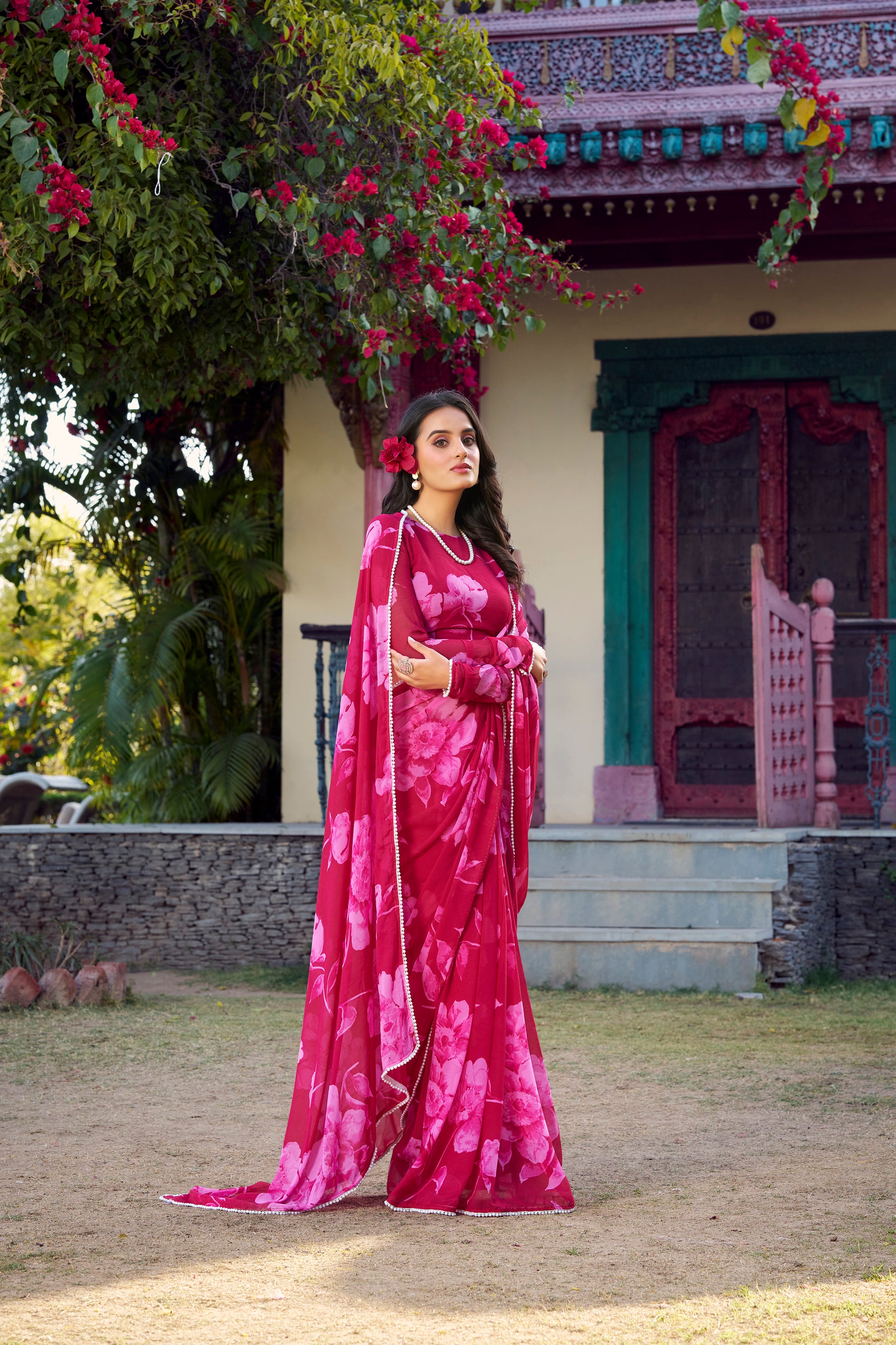 Stylish blue Indian Saree with floral print and lightweight design.