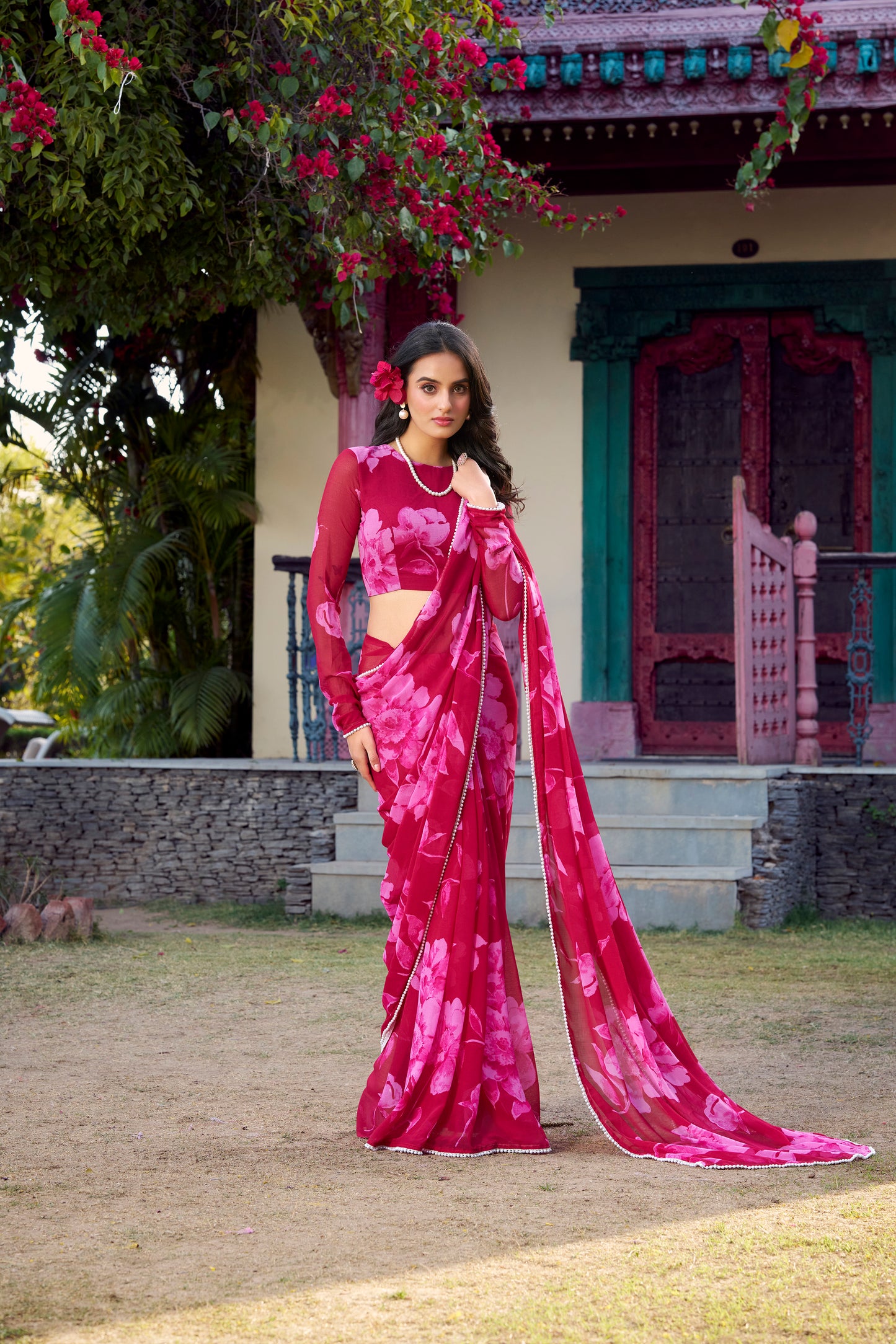 Blue Floral Saree close-up showing delicate detailing and pearl accents.