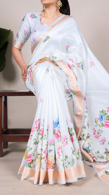 Draped sky blue floral print saree highlighting its lightweight fabric and design.