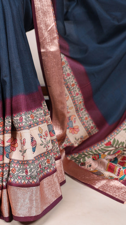 Detailed tasar silk saree border with printed floral and animal designs.