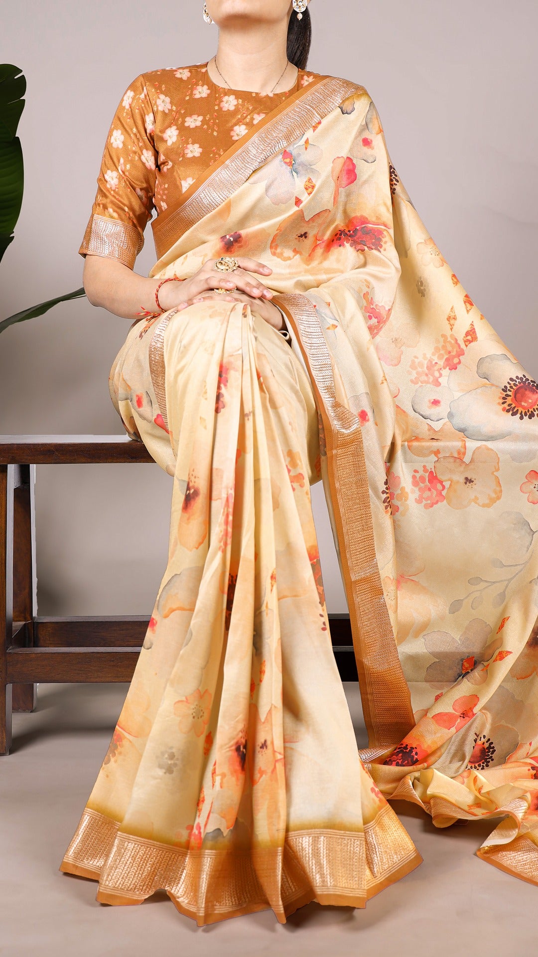 Close-up of the floral print and viscose border on the Tussar silk saree.