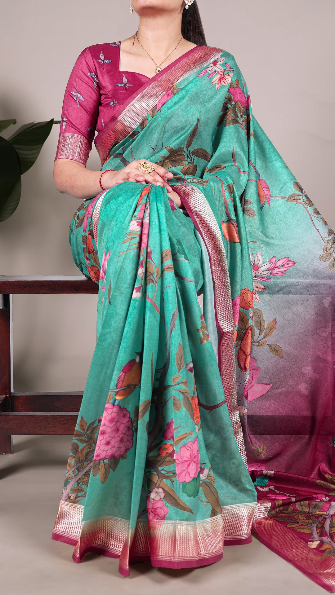 Close-up of the floral print and viscose border on the Tussar silk saree.