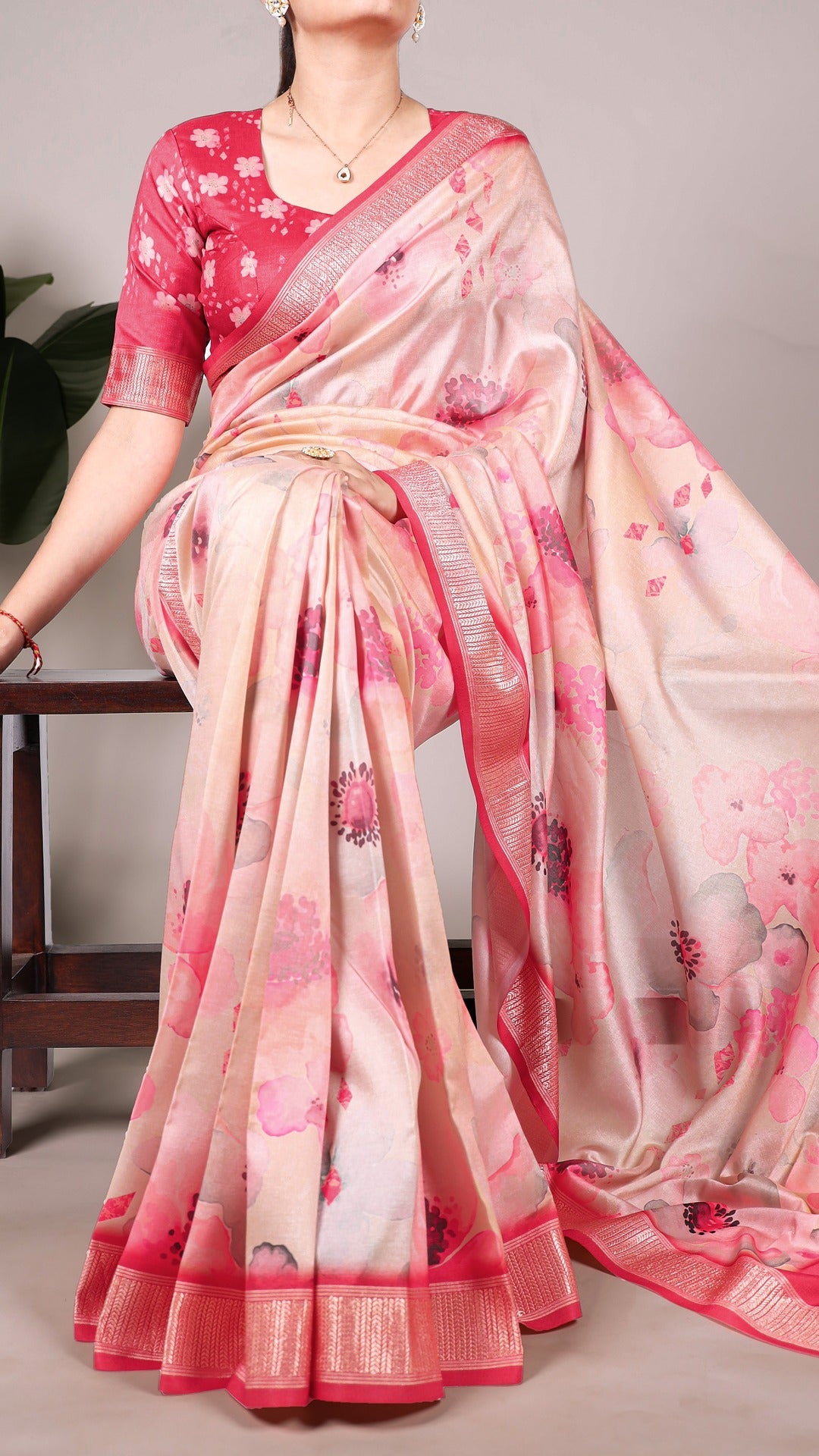 Close-up of the floral print and viscose border on the Tussar silk saree.