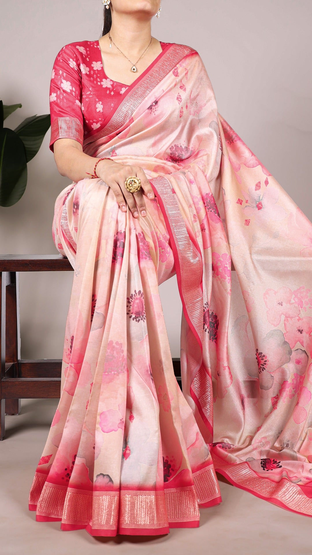 Model wearing a floral printed Tussar silk saree in shades of blue and white.
