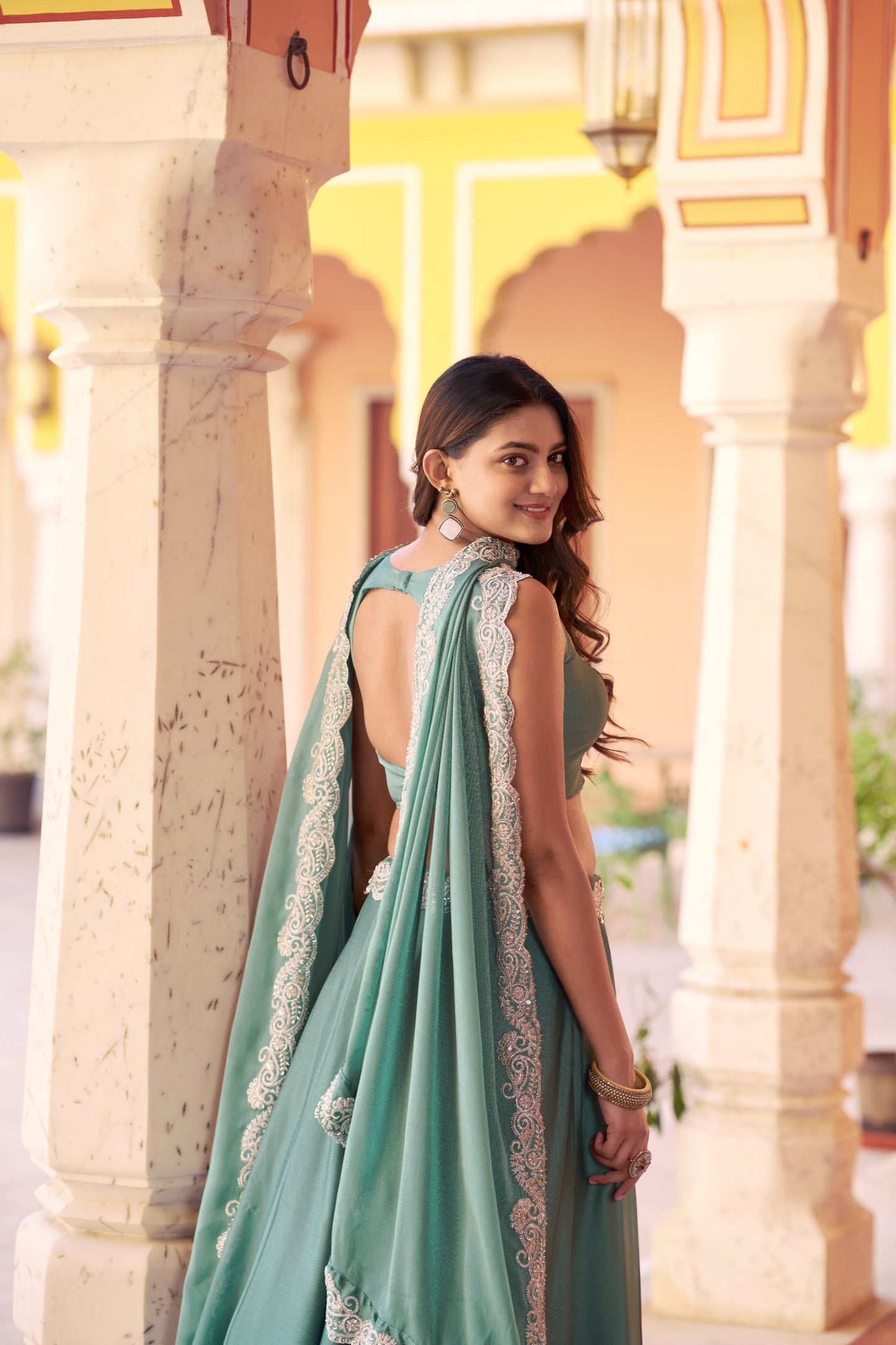 Regal Mist Designer Ensemble with Intricate Embroidery and Luxurious Rangoli Silk