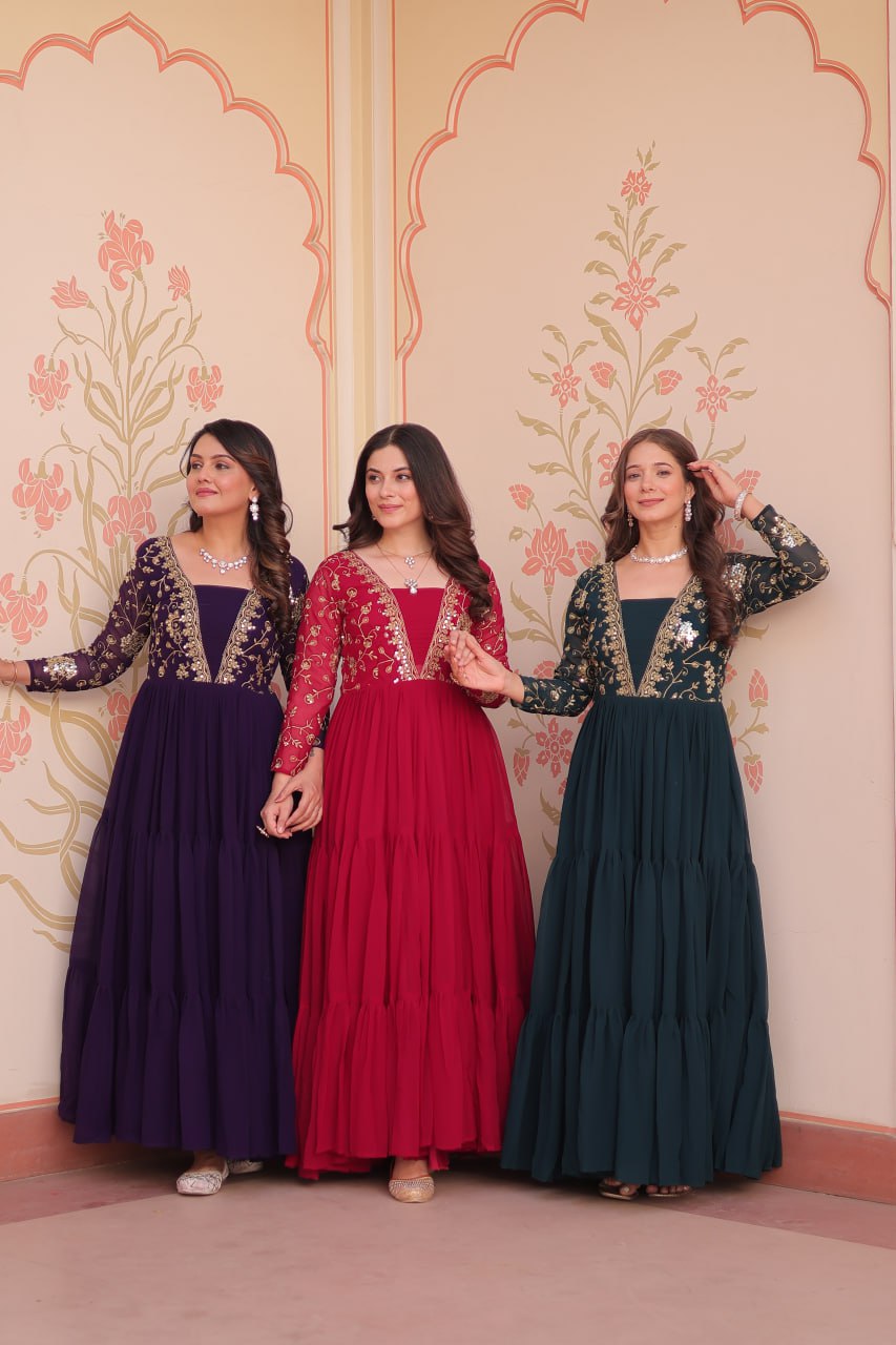 Full view of model in purple gown with embellishments
