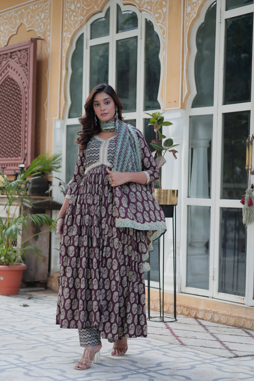Maroon pure cotton kurti set, teal zigzag dupatta, chevron print pants, V-neck, full sleeves, outside view.