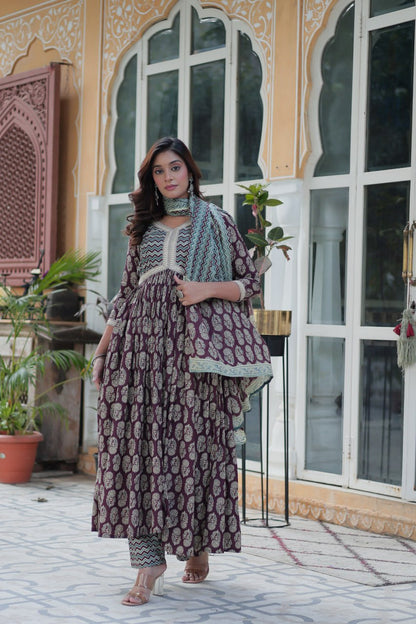 Maroon pure cotton kurti set, teal zigzag dupatta, chevron print pants, V-neck, full sleeves, outside view.