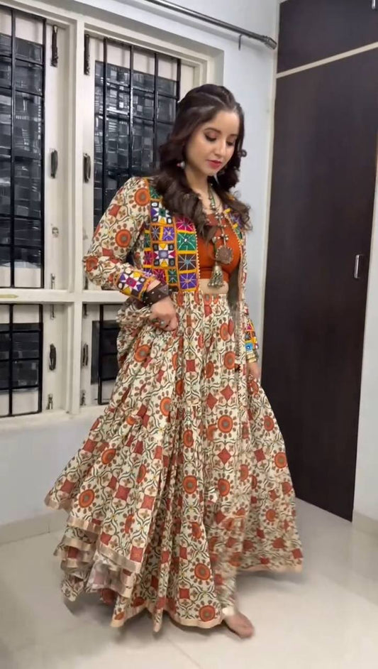 Full view of Kachchi Charm lehenga choli set with multicolor mirror work shrug and bold traditional motifs.