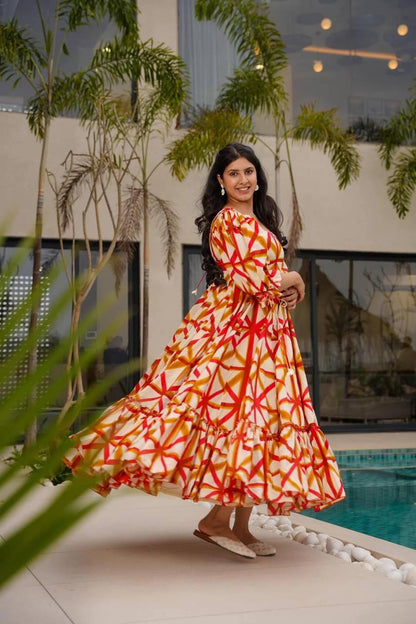 Flowing Sajda Maxi Dress in red-orange-white, South Indian-inspired design.