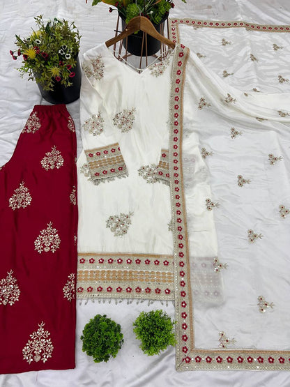 Rangbhoomi's Silk Splendor Party Wear set in white and maroon, laid flat.