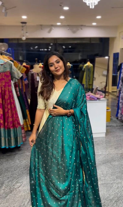 Model wearing Green Victoria Suit Set with embroidered dupatta.