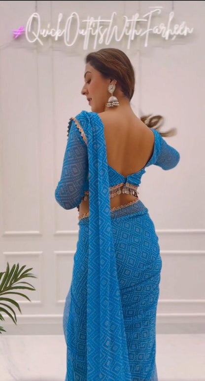 Close up of blue printed georgette ready to wear saree; lightweight and stylish.