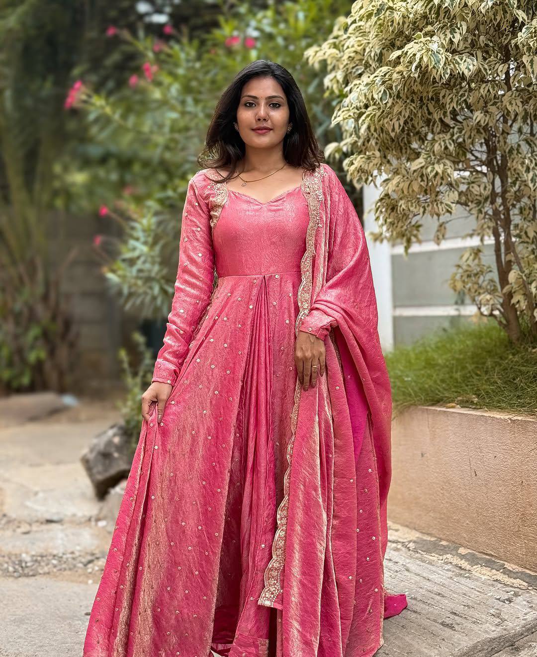 Wine Anarkali gown with gold embroidery and a matching dupatta, perfect for weddings.