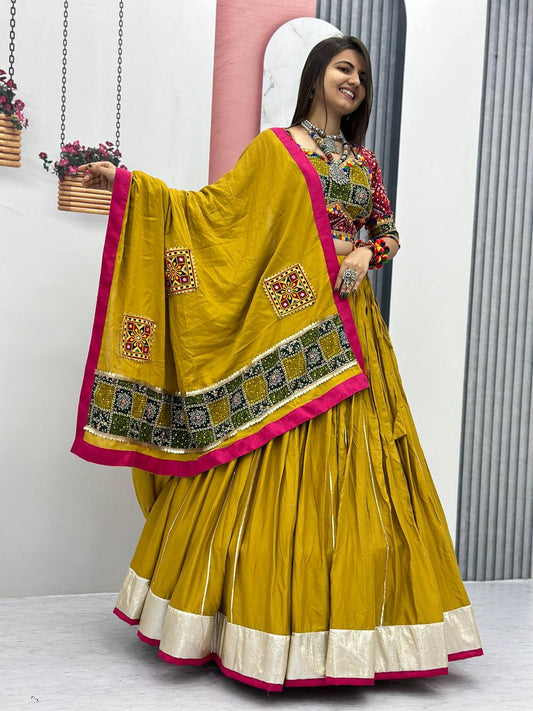 Full view of mustard yellow Lehenga Choli set with handcrafted dupatta and festive jewelry.