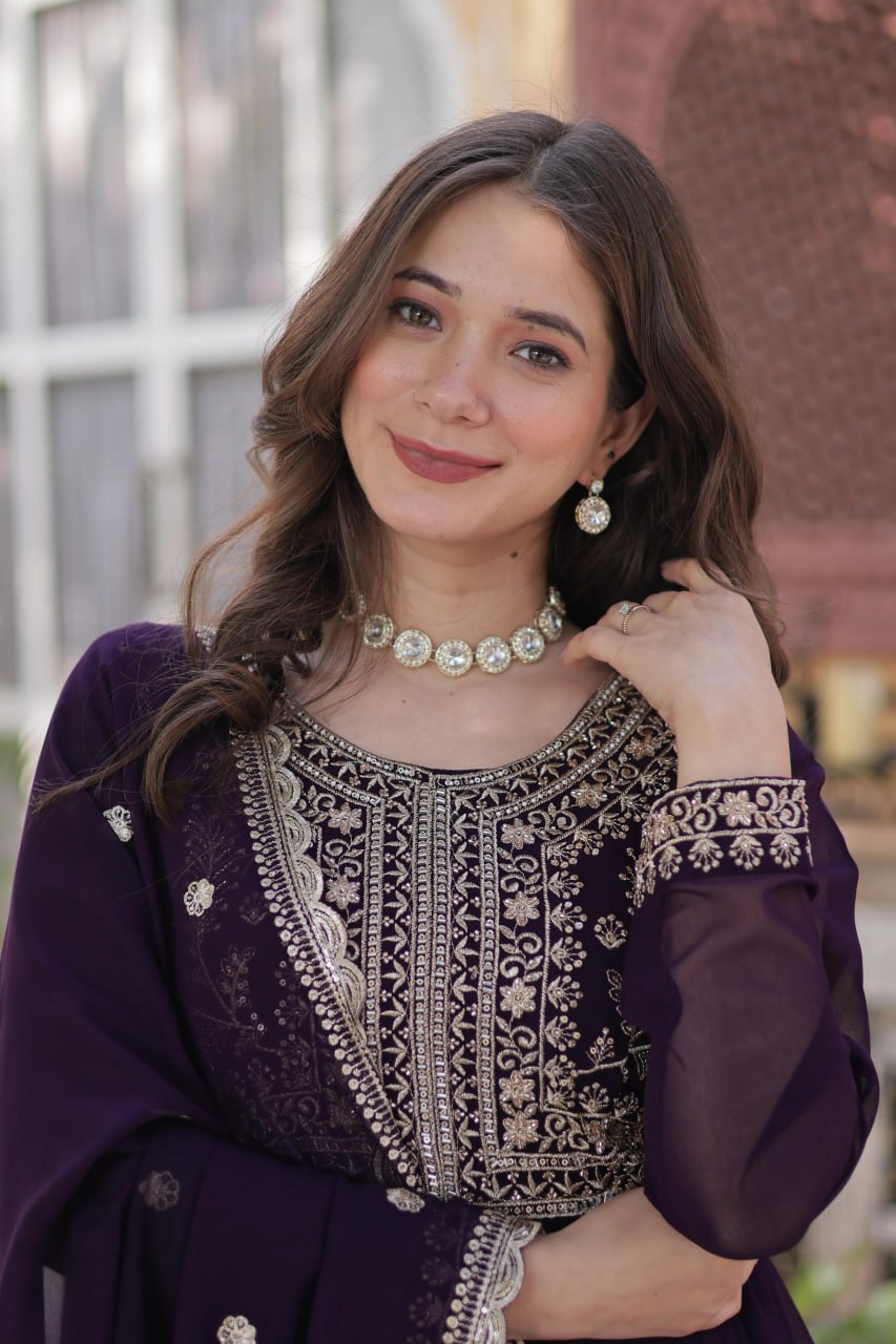 Close-up of the pearl embroidery on the purple Georgette gown.