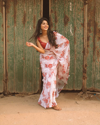 Off-white georgette saree with red floral print, ready to wear style.
