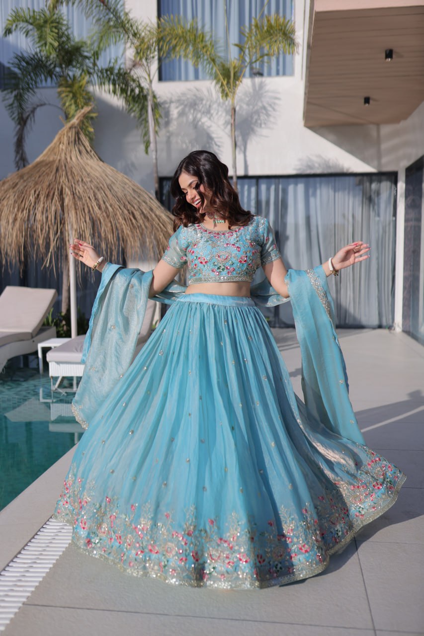 Elegant Lehenga Choli and Dupatta Ensemble in Fendi Silk with Multi-Thread Embroidery