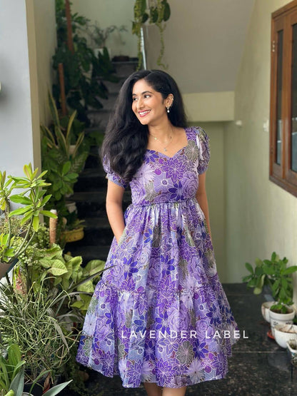 Floral print purple maxi dress with a tiered design, summer fashion.