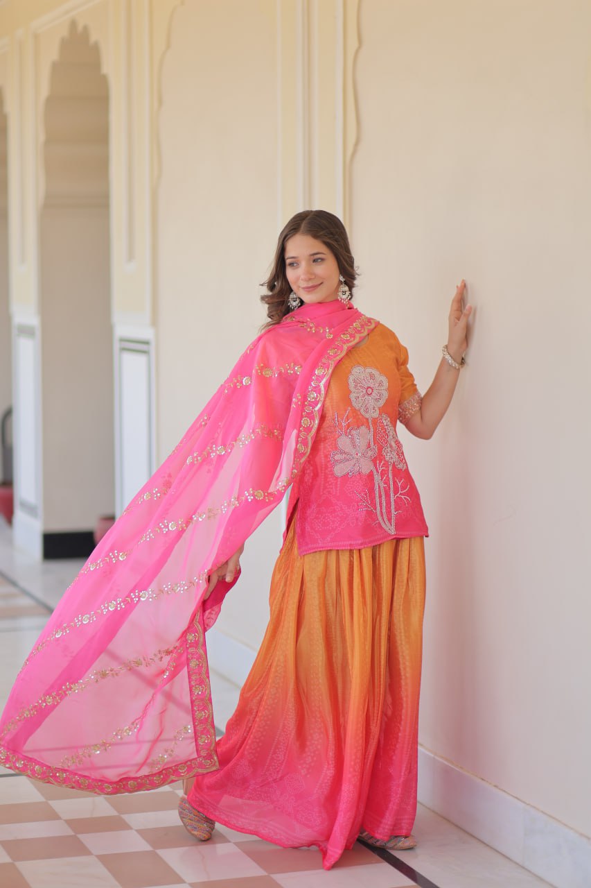 Elegant model in Sharara Suit with pink Tebby Silk Dupatta