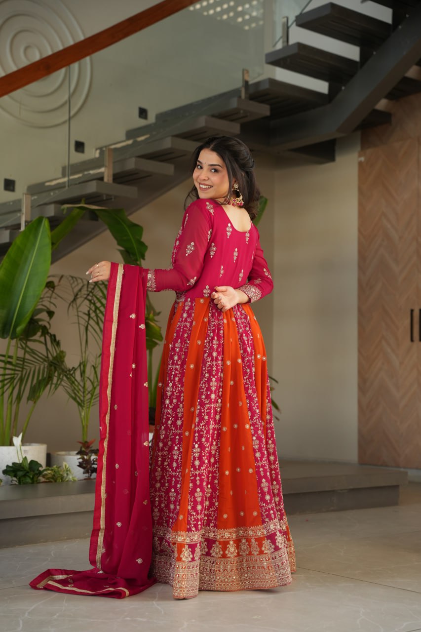 Detailed view of the zari and sequin embroidery on a pink gown.