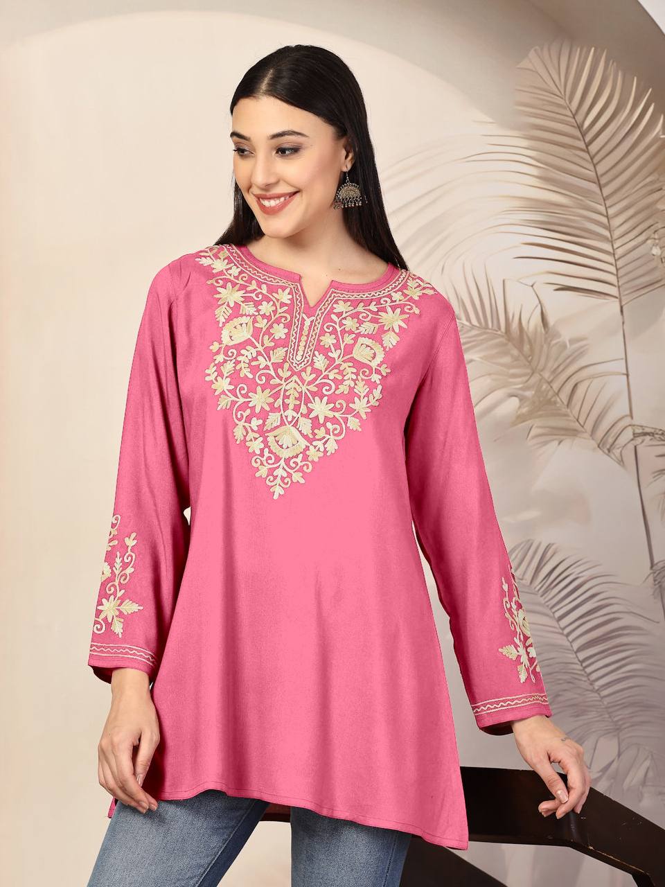 Vibrant pink Adaa ShortKurti with eye-catching gold embroidery and comfortable, loose silhouette.