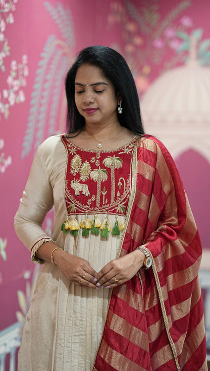 Festival Special Off-White Intricate A-Line Kurti with Flared Pants and Brick Red & Gold Striped Dupatta
