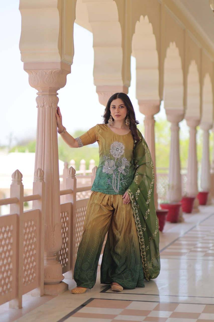 Model wearing Sharara Suit with zari and sequins embroidery