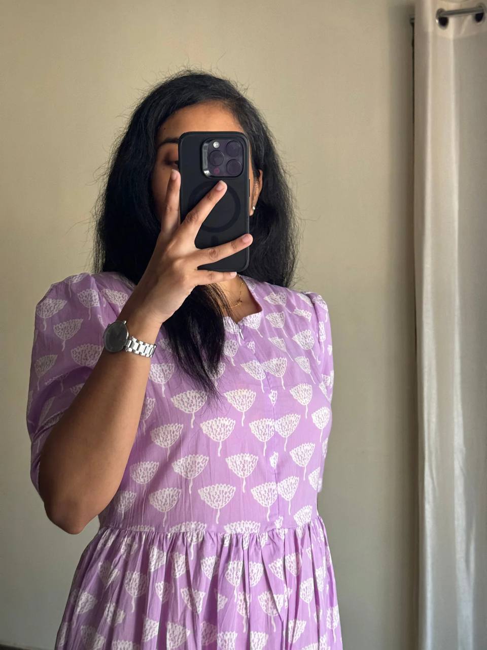 Close-up of lilac Ghibli Maxi dress with white floral print, showcasing the fabric and design details.