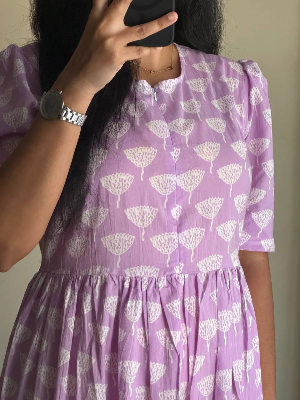 Detailed view of the lilac Ghibli Maxi dress, highlighting the neckline and sleeve design.