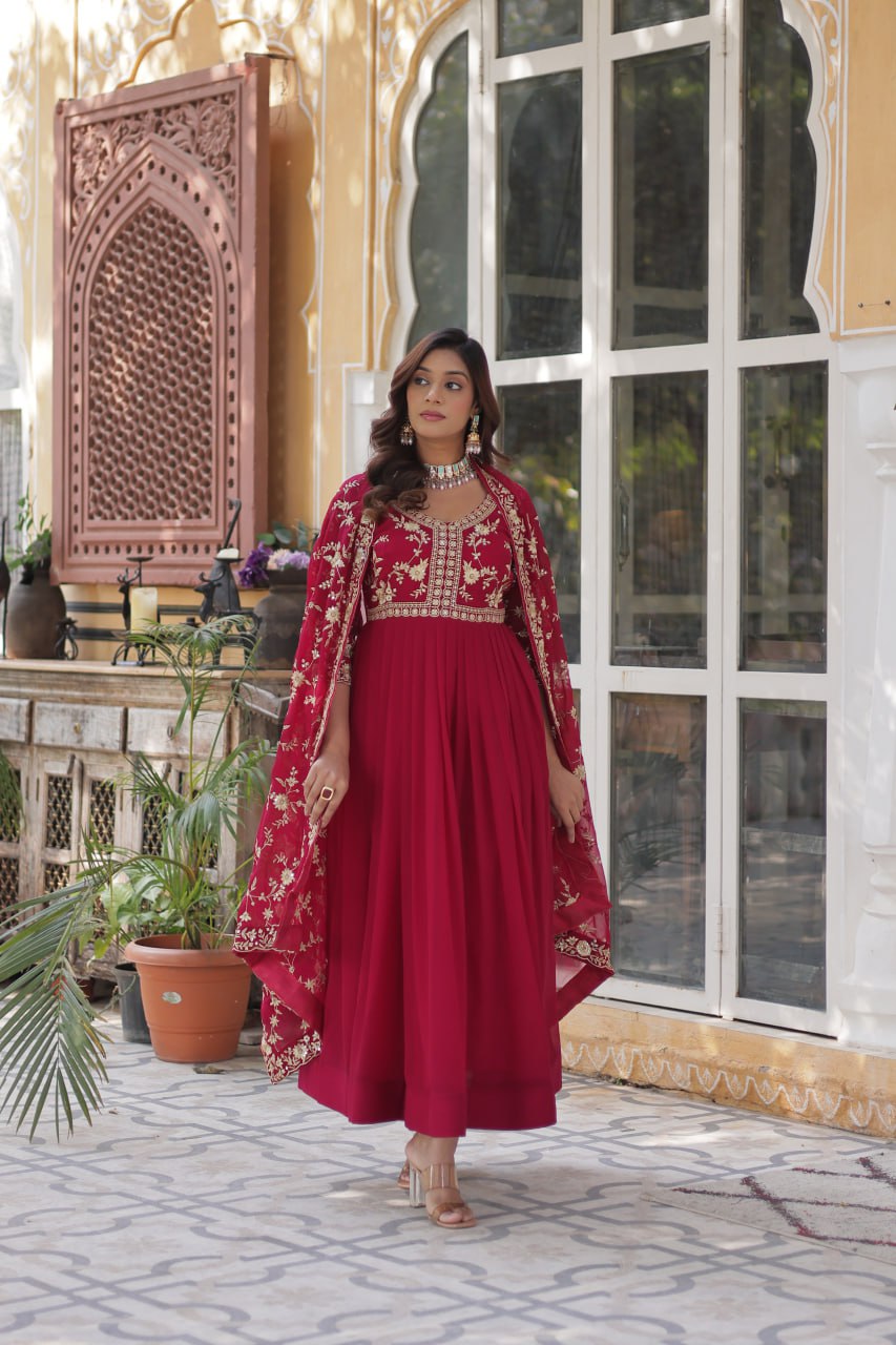 Model wearing premium pink gown with embroidered dupatta.