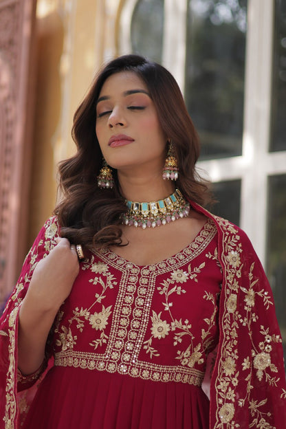 Detailed embroidery on the neckline of the premium pink Indian gown.