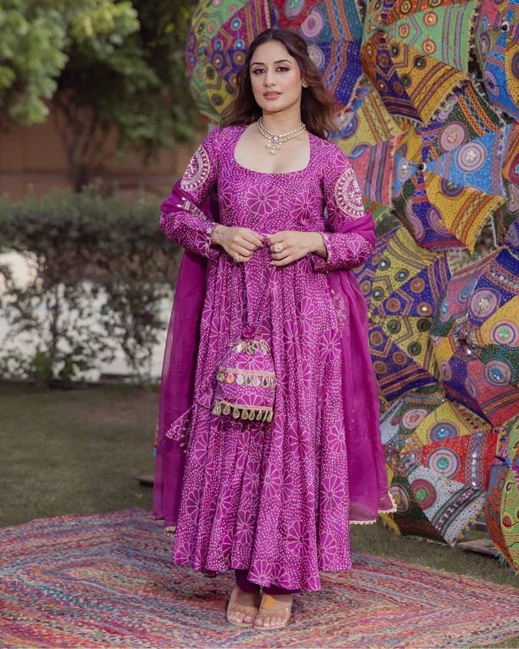 Elegant purple gown with palazzo, dupatta, and matching purse