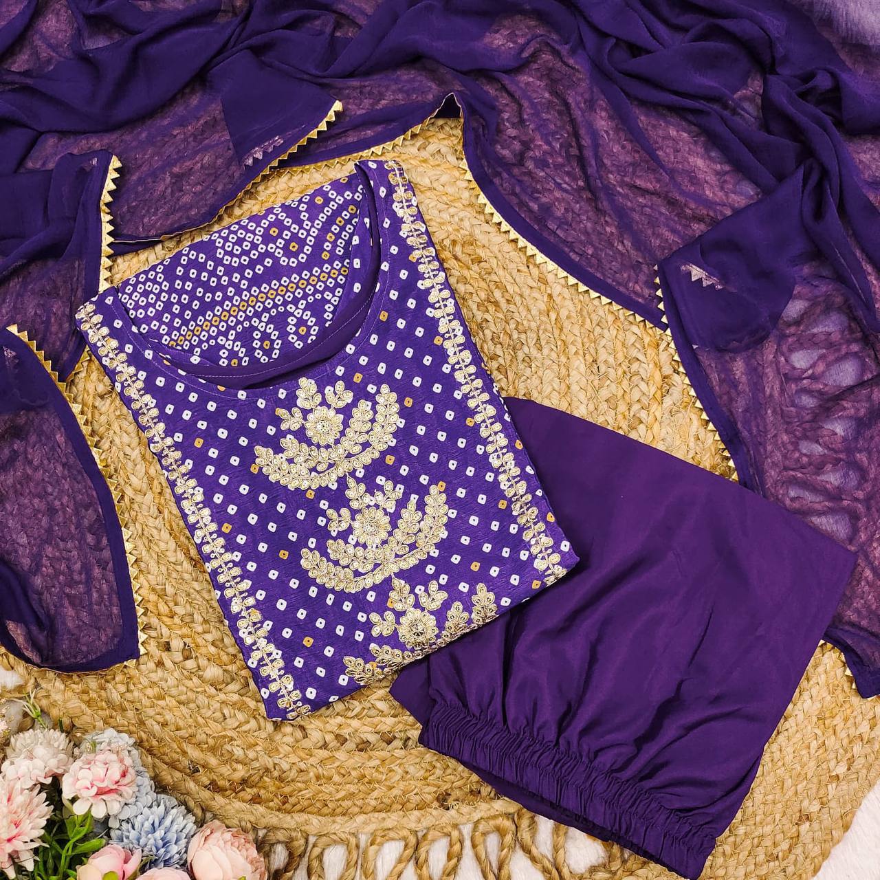 Complete purple Chinon kurta pajama set with Bandhani detail and matching dupatta.