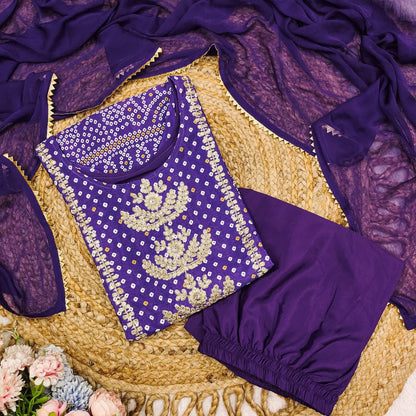Complete purple Chinon kurta pajama set with Bandhani detail and matching dupatta.