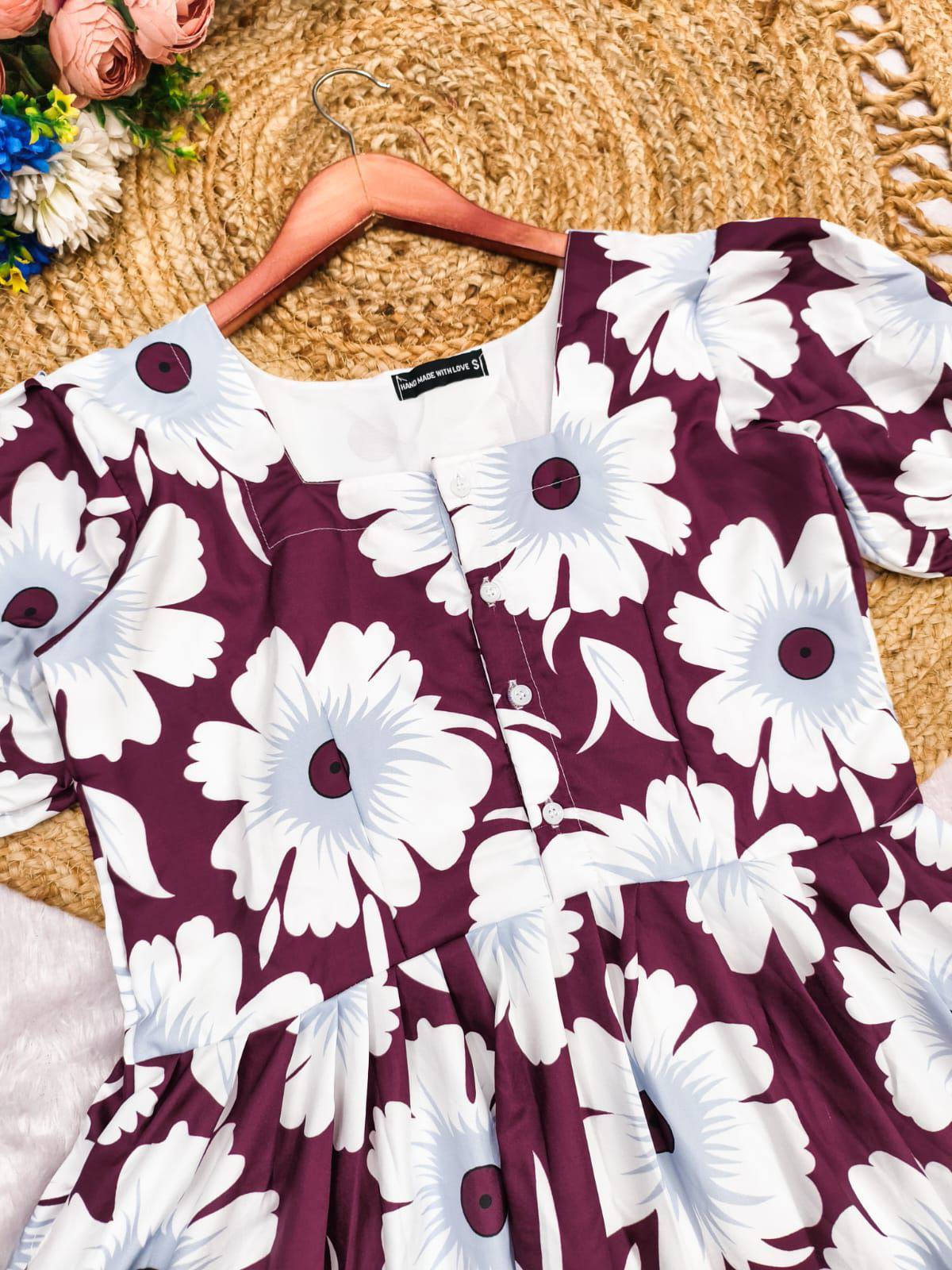 Maroon floral cotton maxi dress with tiered design and button-down front.